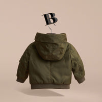 CAPER GREEN Bomber à capuche en sergé technique