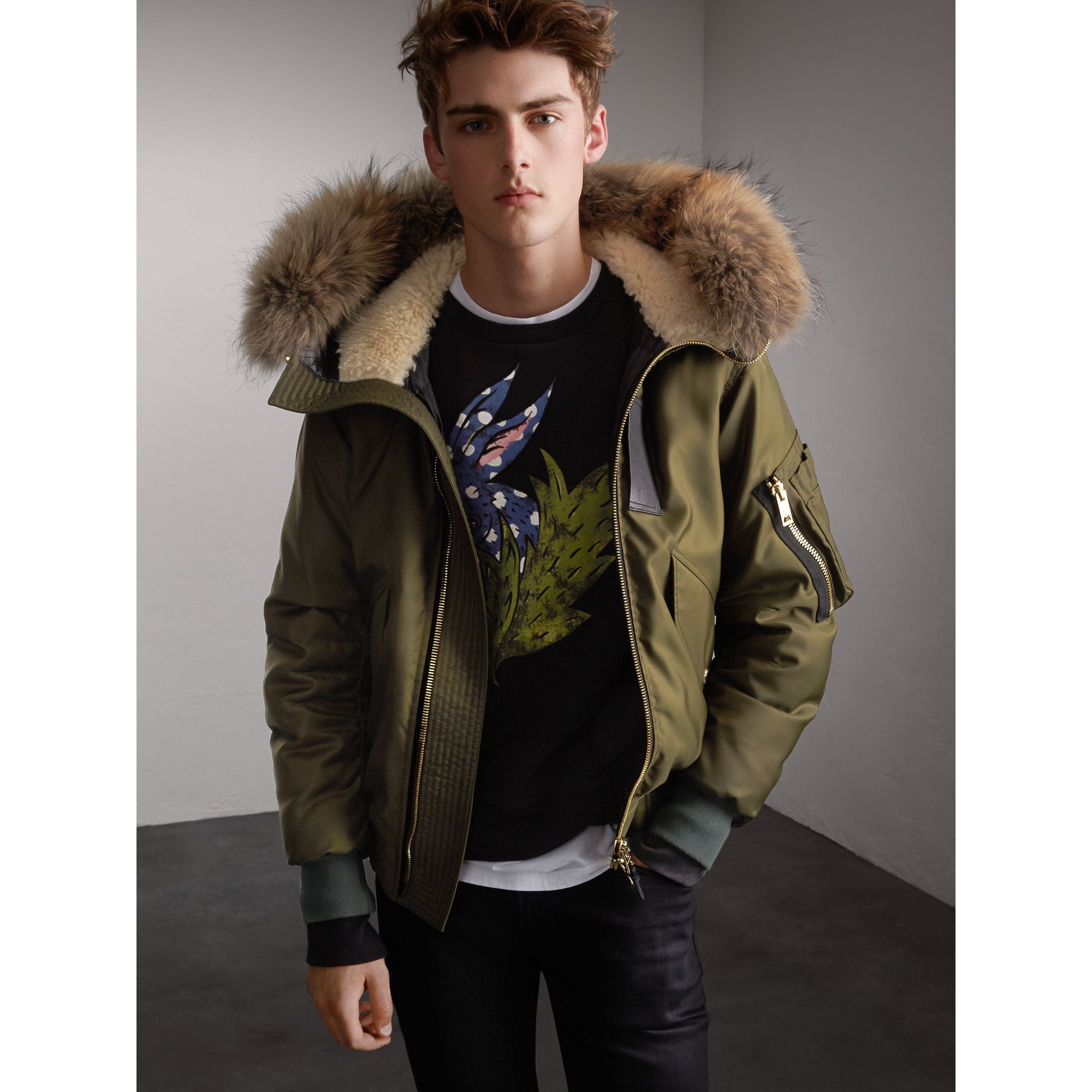 CAPER GREEN Veste rembourrée en duvet de canard avec capuche en fourrure de raton laveur et shearling