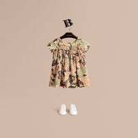 Robe à smocks en coton avec imprimé bestiaire - Rose taupe antique