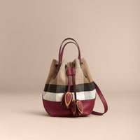 BURGUNDY RED Petit sac Burberry Bucket en toile Canvas check et cuir