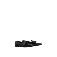BLACK Mocassins en cuir verni avec pampilles