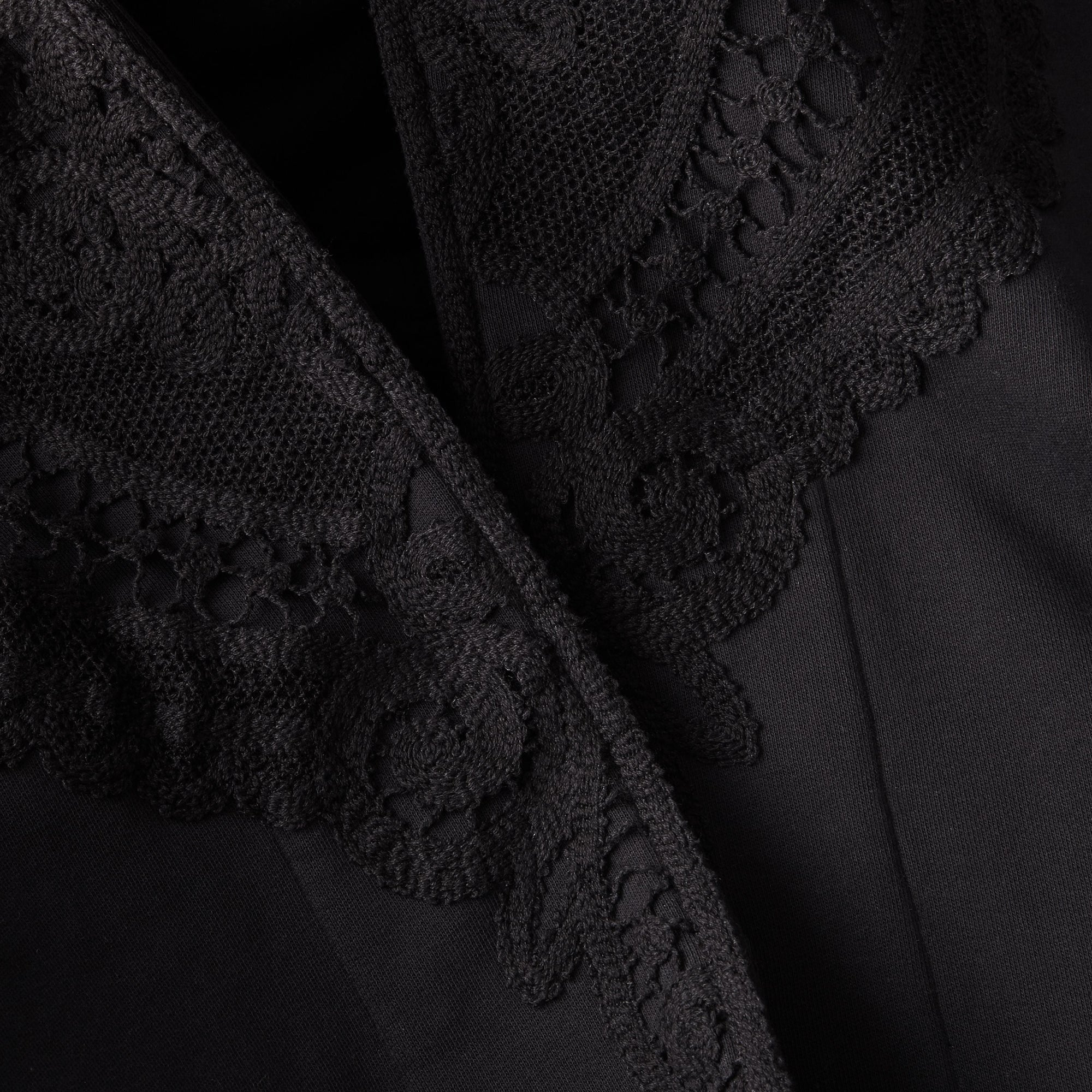 BLACK Poncho à capuche en jersey avec appliqués en dentelle
