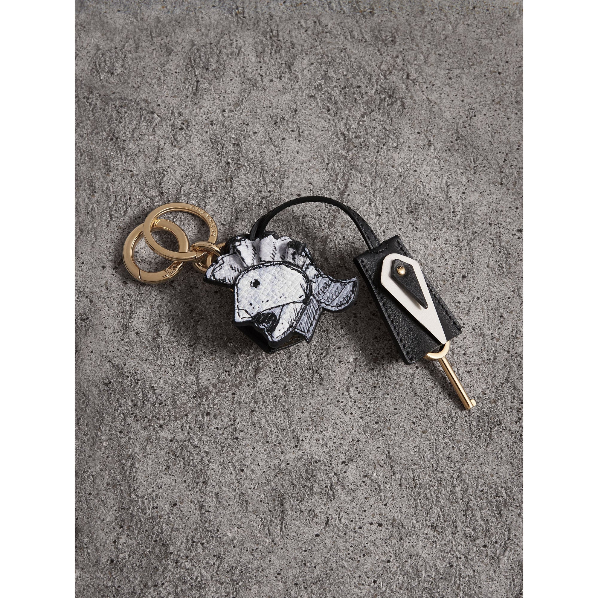 BLACK/WHITE Bijou porte-clés en cuir à motif Pallas Helmet avec cadenas
