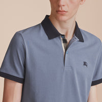 STONE BLUE Polo bicolore en piqué de coton avec patte à motif check