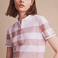 ANTIQUE ROSE Polo en piqué de coton extensible à motif check