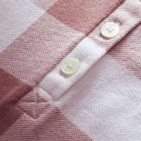 ANTIQUE ROSE Polo en piqué de coton extensible à motif check