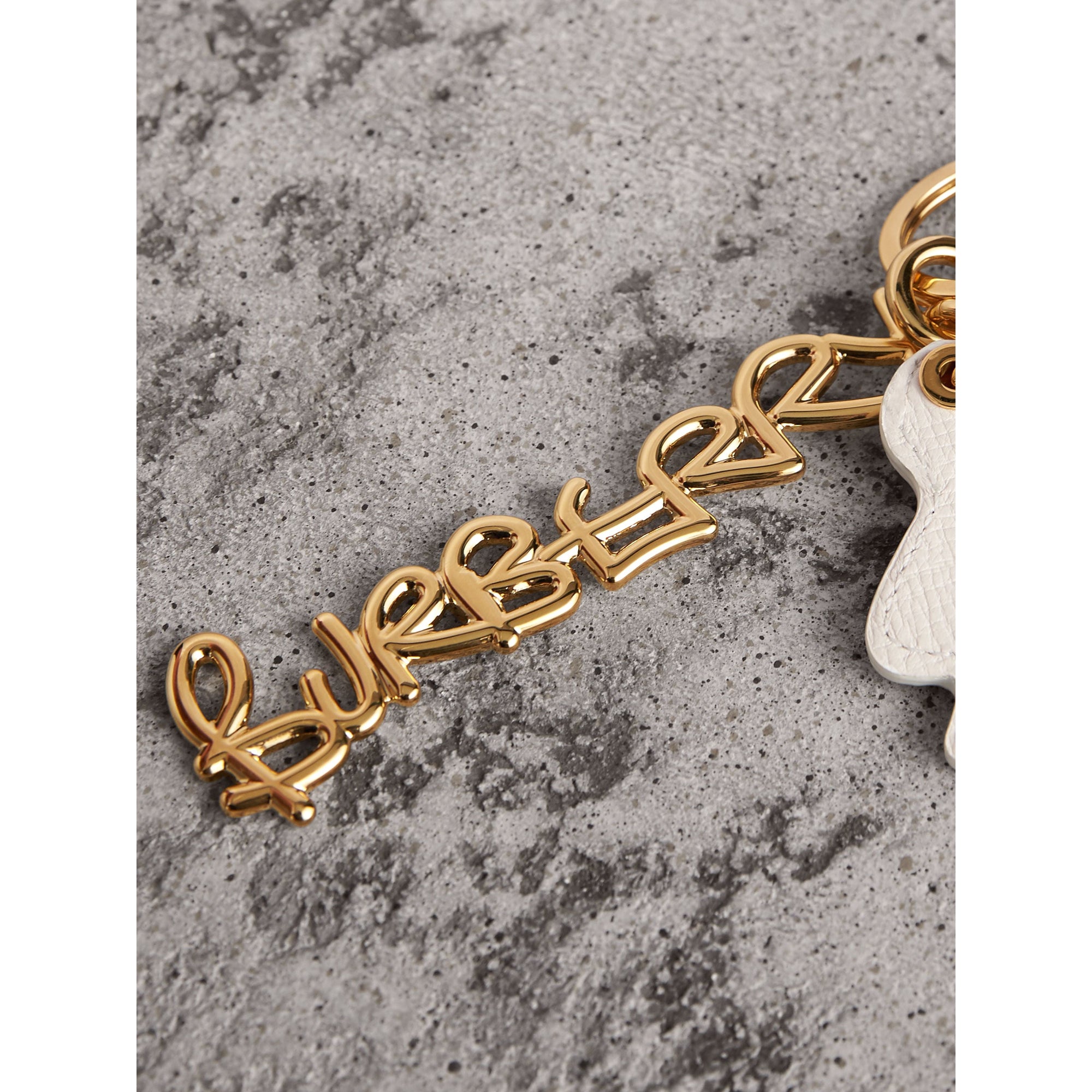 LIGHT GOLD Bijou porte-clés en cuir à motif Doodle