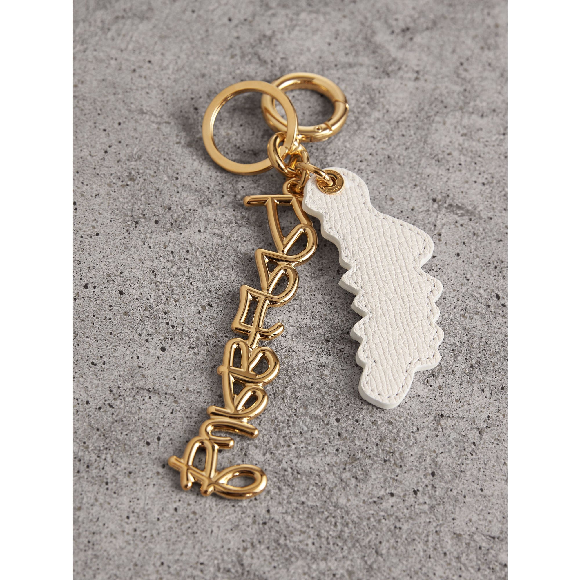 LIGHT GOLD Bijou porte-clés en cuir à motif Doodle