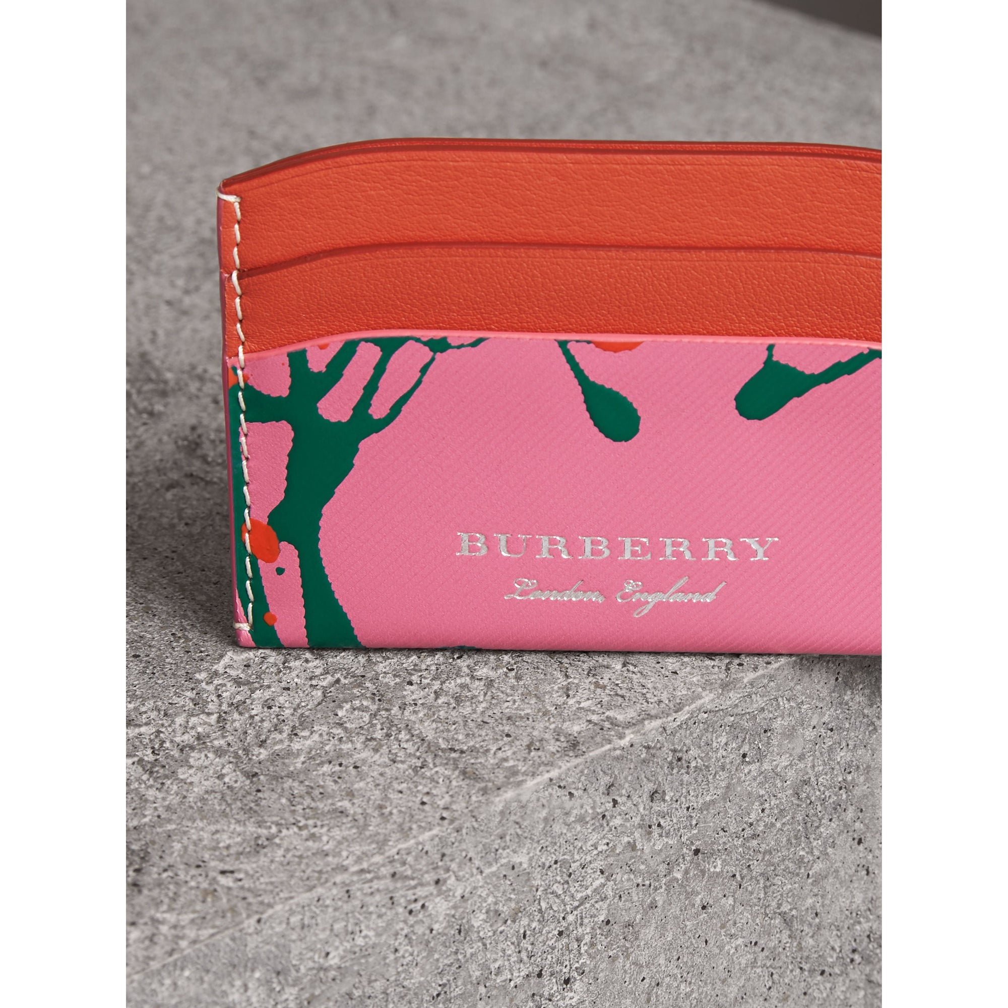 ROSE PINK/ORANGE RED Porte-cartes en cuir trench à imprimé Splash
