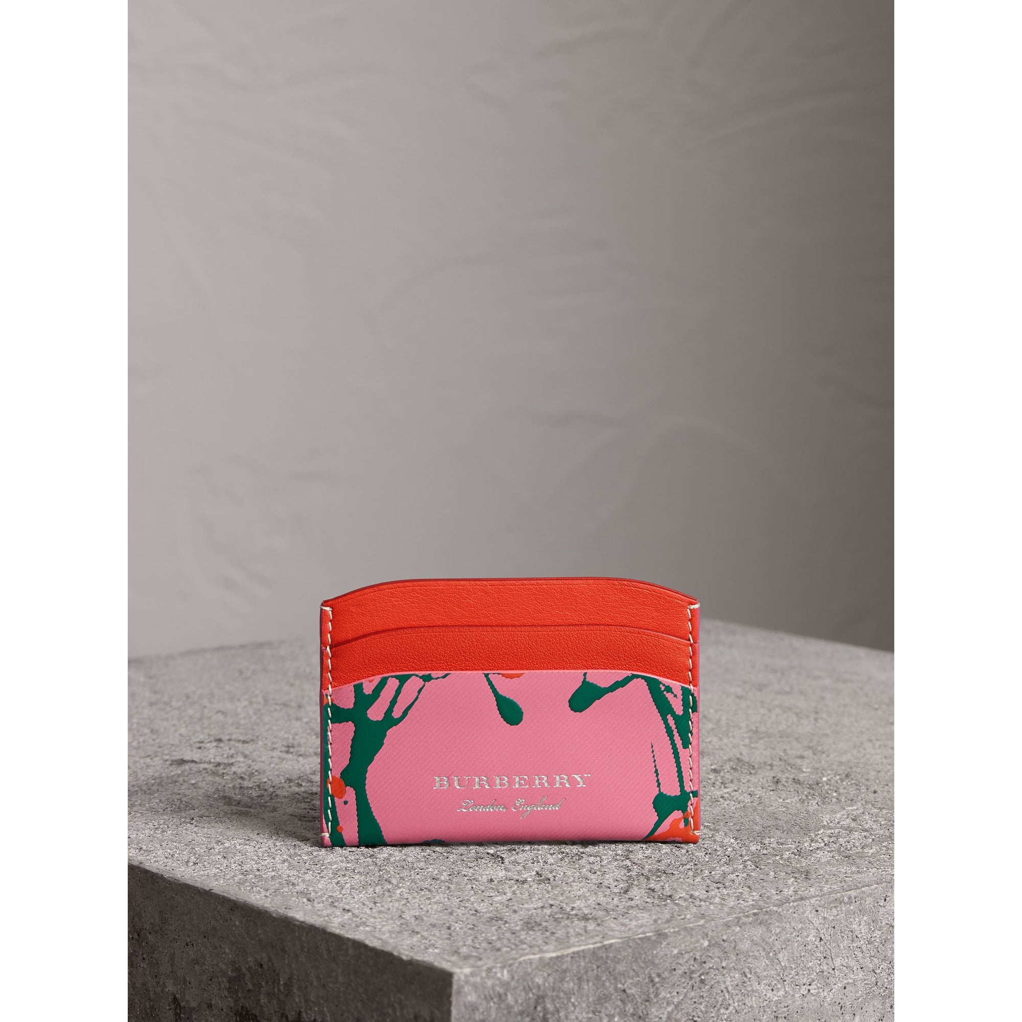 ROSE PINK/ORANGE RED Porte-cartes en cuir trench à imprimé Splash