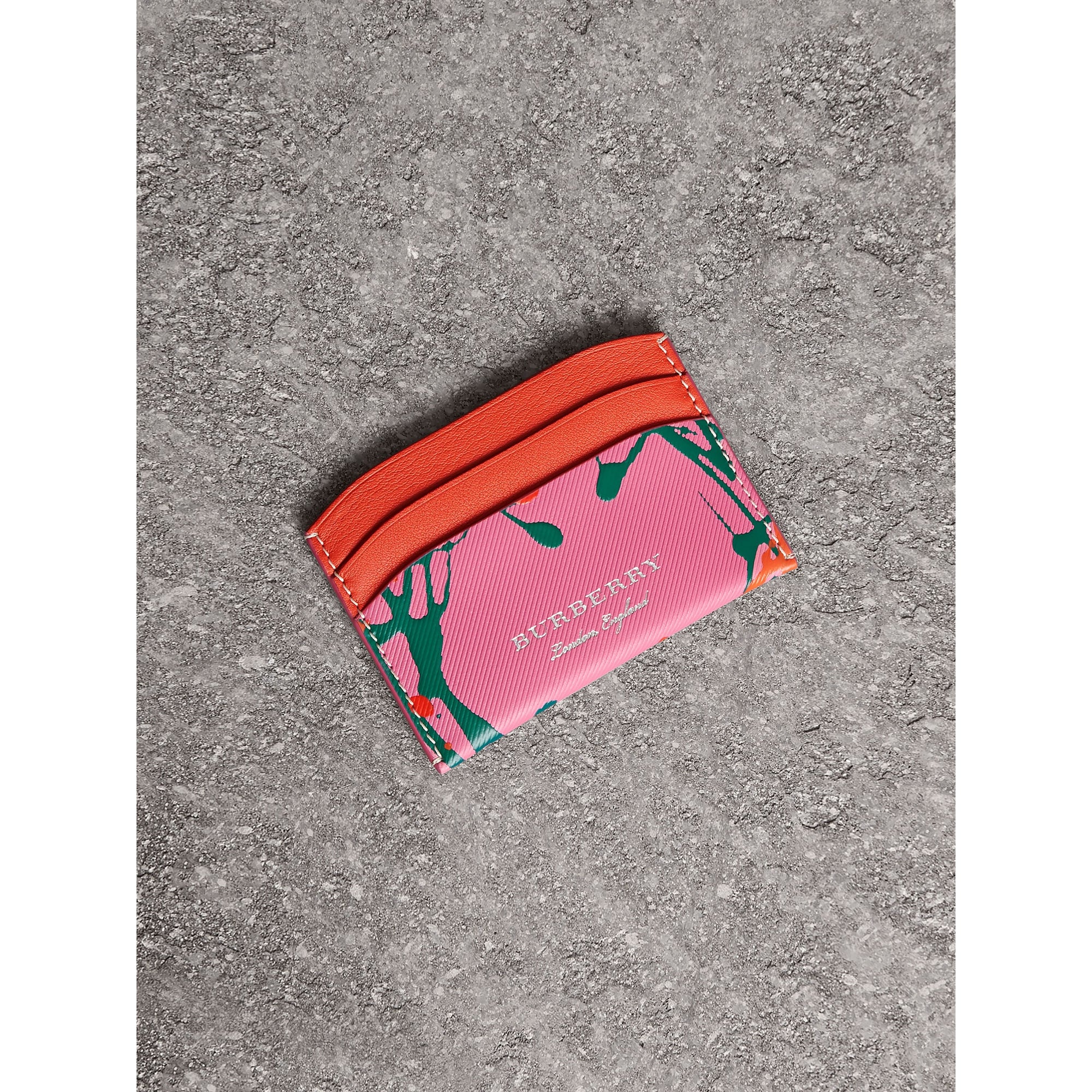 ROSE PINK/ORANGE RED Porte-cartes en cuir trench à imprimé Splash