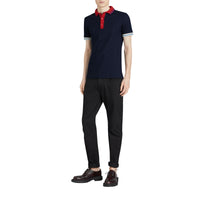 NAVY Polo en coton à détails rayés et côtelés bicolores