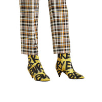 VIBRANT YELLOW Bottines en cuir à imprimé graffiti