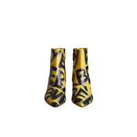 VIBRANT YELLOW Bottines en cuir à imprimé graffiti