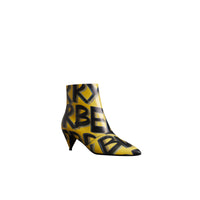 VIBRANT YELLOW Bottines en cuir à imprimé graffiti