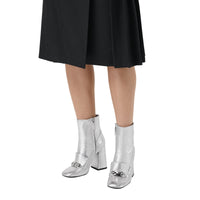 SILVER Bottines en cuir avec bride cloutée