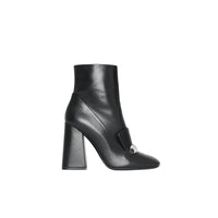 BLACK Bottines en cuir avec bride cloutée