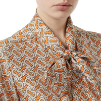 BRIGHT ORANGE Chemisier en soie avec ruban à nouer Monogram