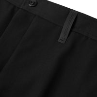 BLACK Pantalon ample en laine avec découpe arrière