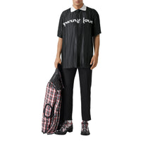 BLACK Polo plissé en satin avec slogan