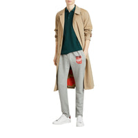 PALE GREY MELANGE Pantalon de survêtement avec imprimé étiquette en graffiti