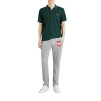 PALE GREY MELANGE Pantalon de survêtement avec imprimé étiquette en graffiti