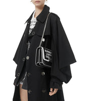 BLACK/WHITE Petit sac TB en cuir avec logo