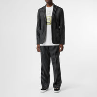 Veste de costume slim en laine à fines rayures avec boutons pression - Noir