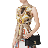 Petite clutch enveloppe Monogram TB matelassé - Noir