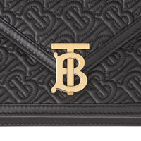 Petite clutch enveloppe Monogram TB matelassé - Noir