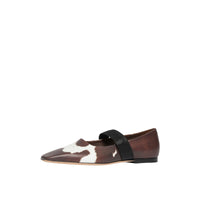 COW PRINT Chaussures plates en cuir à imprimé vache avec logo