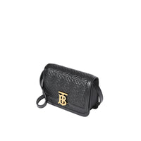 Sac TB en cuir d'agneau monogram matelassé - Noir