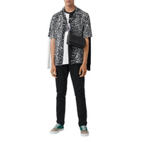Chemise à manches courtes en sergé à imprimé léopard - Noir
