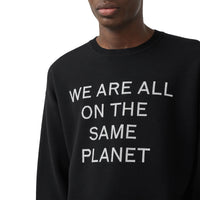 BLACK Pull en laine mérinos mélangée avec slogan