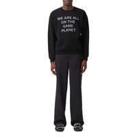 BLACK Pull en laine mérinos mélangée avec slogan