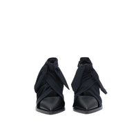 BLACK Mules à bout pointu en cuir avec nœud