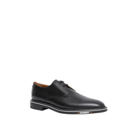 BLACK Derbies en cuir surpiqué avec logo
