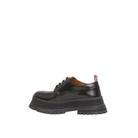 BLACK Derbies en cuir avec logo