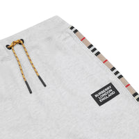 WHITE MELANGE Pantalon de survêtement en coton à rayures iconiques