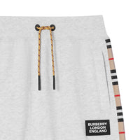 WHITE MELANGE Pantalon de survêtement en coton à rayures iconiques