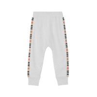 WHITE MELANGE Pantalon de survêtement en coton à rayures iconiques