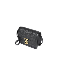 Mini sac TB en cuir d'agneau monogram matelassé - Noir