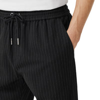 BLACK STRIPE Pantalon de survêtement en jersey stretch à fines rayures