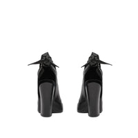 BLACK Mules à bout pointu en cuir avec nœud