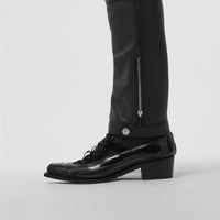 BLACK Pantalon en cuir contrecollé façon biker avec logo appliqué