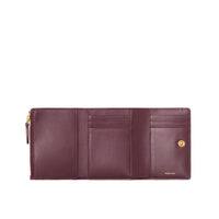 DEEP MAROON Petit portefeuille à rabat en cuir Monogram