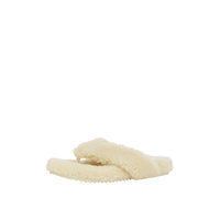VANILLA Claquettes en shearling avec logo