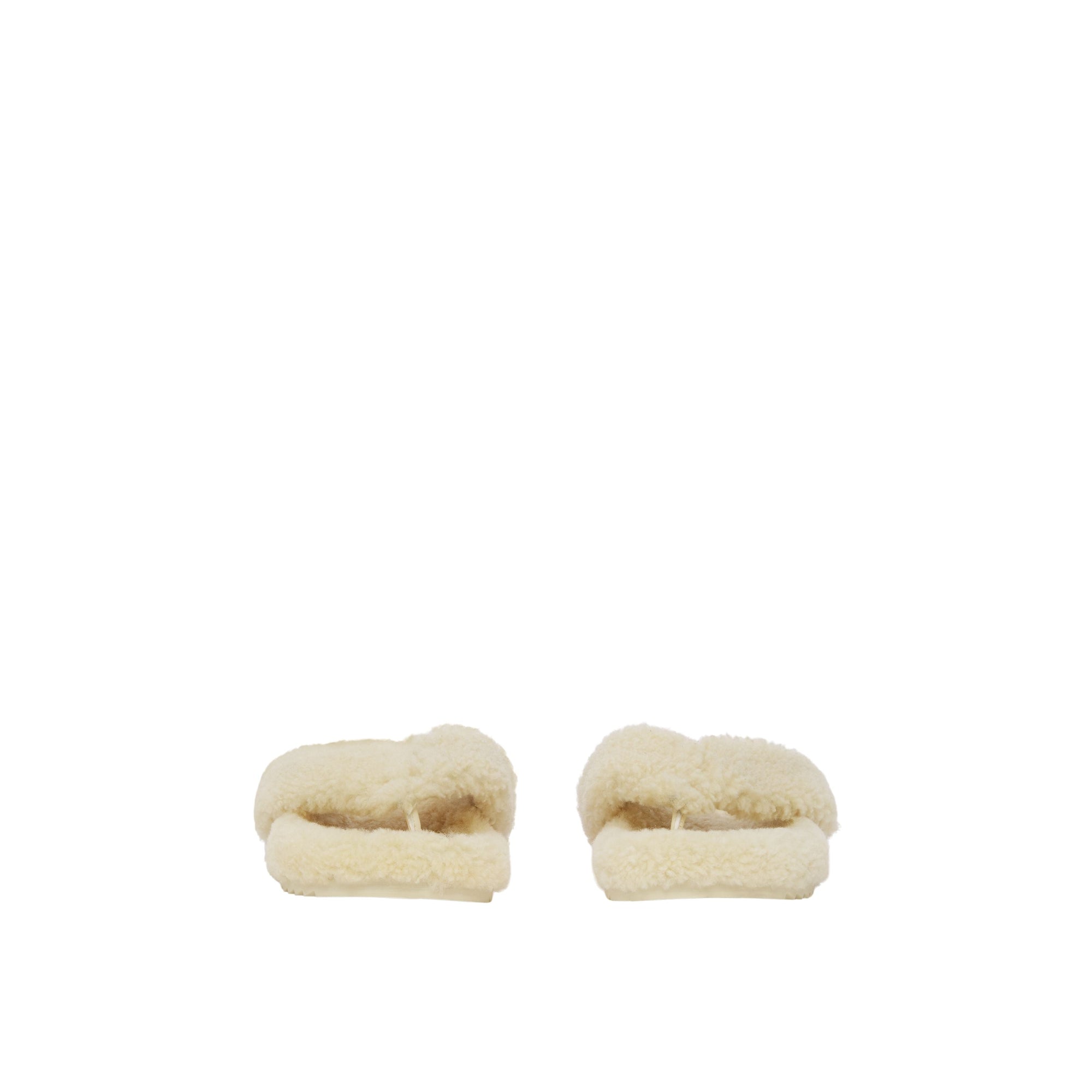 VANILLA Claquettes en shearling avec logo