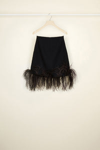 Jupe courte en tweed à plumes - Noir